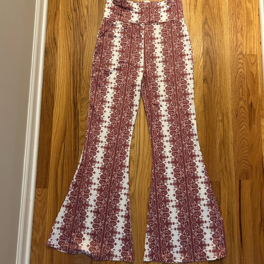 red and white patterned pants